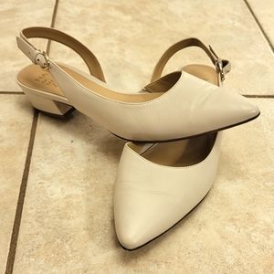 White pointed toe heels